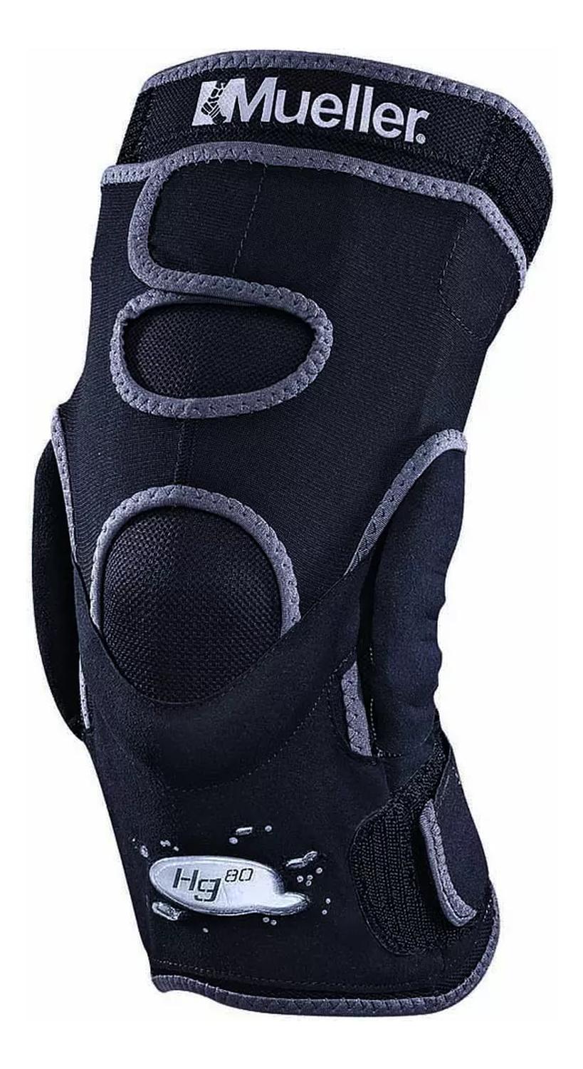 Rodillera Mueller HG80 con bisagras ajustables, soporte para la rodilla, en color negro, con correas de ajuste y protección ergonómica.
