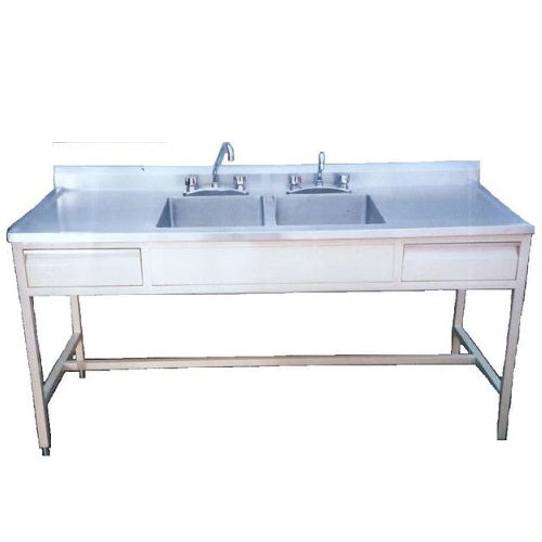 Mesa alta MSI de 180 cm con doble fregadero central y cajones de la marca Beracah Medica, con superficie de acero inoxidable.