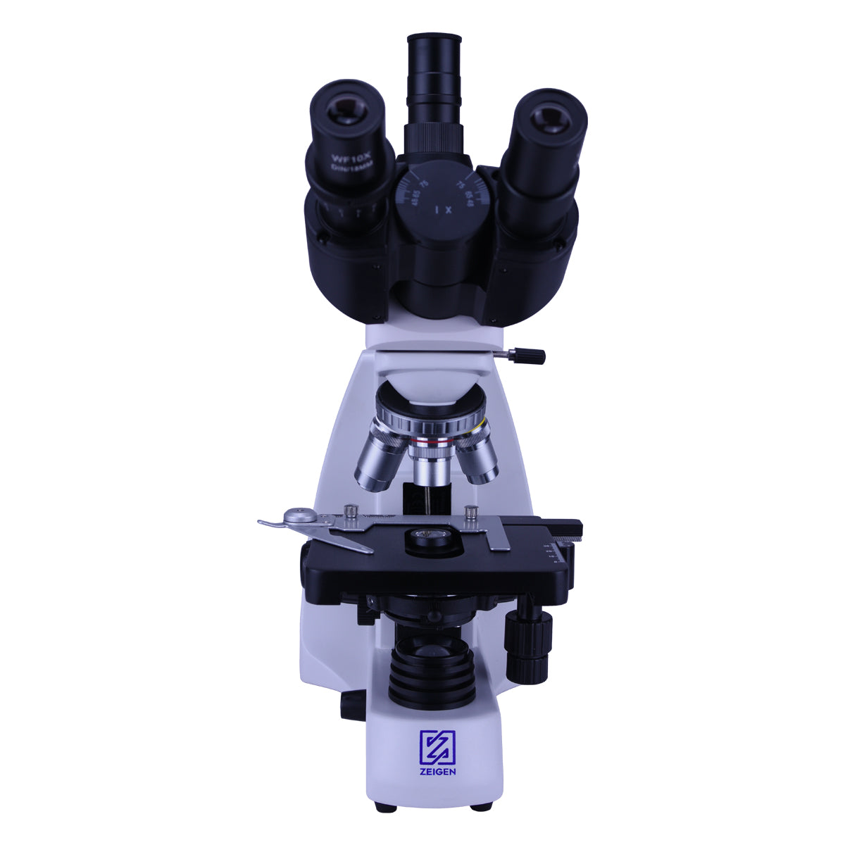 Microscopio biológico trinocular VX-TRINO de Beracah Médica en laboratorio, con objetivos y oculars visibles.