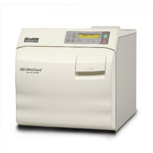 Autoclave de mesa automático M9 de Ritter con puerta manual, en color gris y panel de control en la parte frontal.